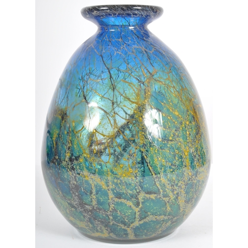 496 - A large 20th Century Mdina style glass vase of bulbous form having a flat rim, short waisted neck an... 