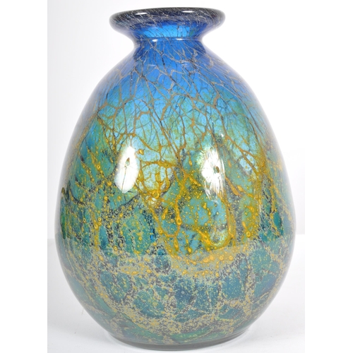 496 - A large 20th Century Mdina style glass vase of bulbous form having a flat rim, short waisted neck an... 