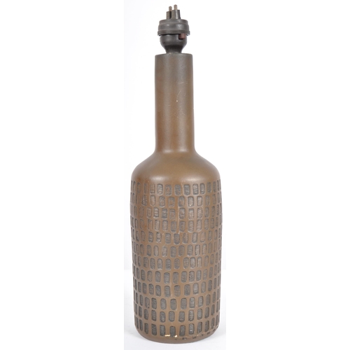 497 - Searchlight - A contemporary designer resin table lamp light of bottle form in dark green with geome... 