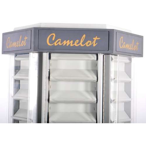 510 - A late 20th Century Camelot shop display revolving display cabinet. Comprises an clear plastic displ... 