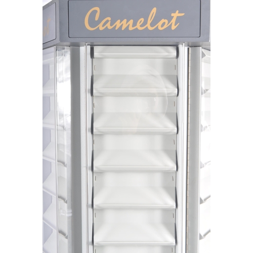 510 - A late 20th Century Camelot shop display revolving display cabinet. Comprises an clear plastic displ... 