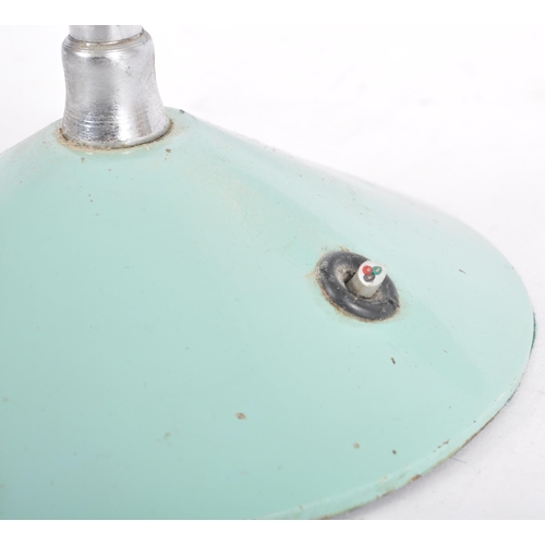 517 - A retro mid 20th Century French adjustable desk / table lamp light having a light blue conical shade... 