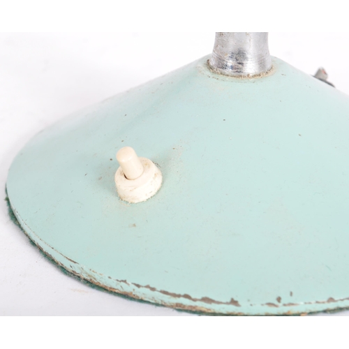 517 - A retro mid 20th Century French adjustable desk / table lamp light having a light blue conical shade... 