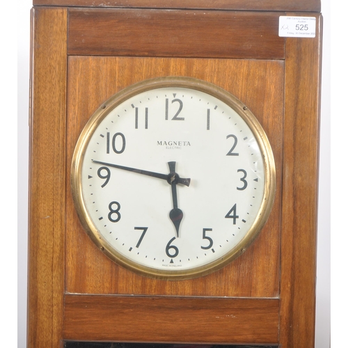 525 - Magneta - A retro vintage mid 20th Century electric master dual cased wall clock having a circular d... 