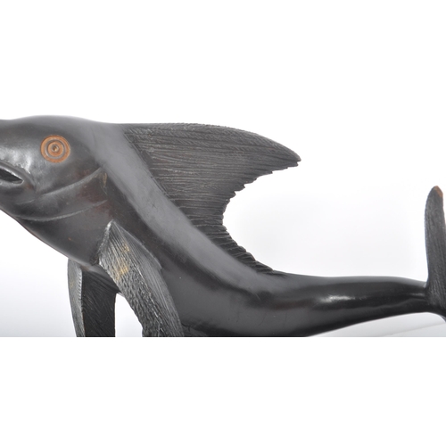 526 - A retro 20th Century ebonised wood hand carved sculpture in the form of a swordfish with carved deta... 