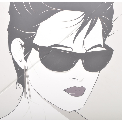 539 - After Patrick Nagel (1945-1984) -  A retro 20th Century 1980s framed advertising print for Patrick N... 