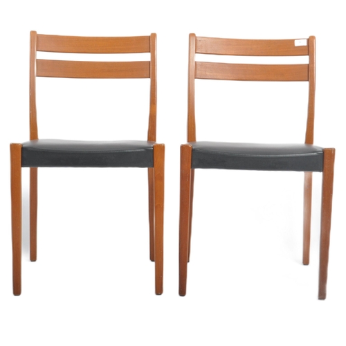 54 - Svegards Markaryd - A matching pair of retro 20th Century Danish teak dining chairs. Each chair havi... 