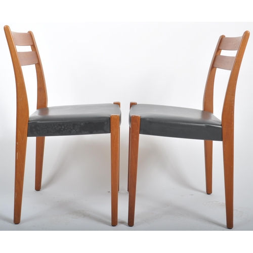 54 - Svegards Markaryd - A matching pair of retro 20th Century Danish teak dining chairs. Each chair havi... 