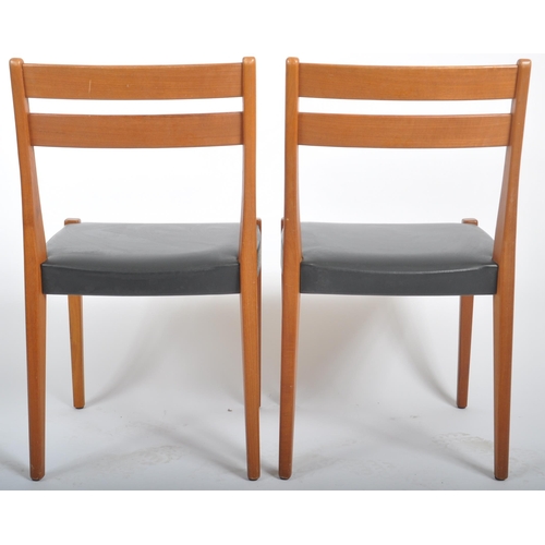 54 - Svegards Markaryd - A matching pair of retro 20th Century Danish teak dining chairs. Each chair havi... 