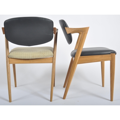 545 - After Kai Kristiansen - Model 42 - A matching pair of retro contemporary Danish Scandinavian oak woo... 