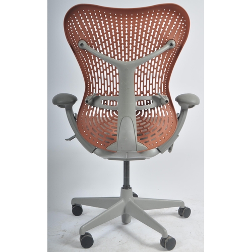 555 - Studio 7.5 - Herman Miller - Mirra 2 - A retro late 20th Century swivel desk office chair having adj... 