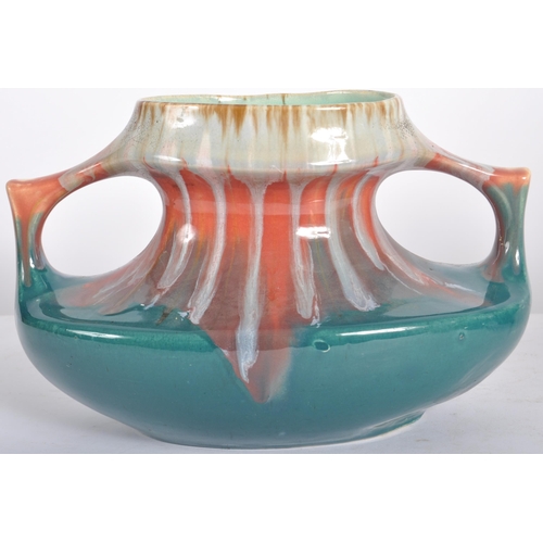 583 - A selection of retro 20th Century studio pottery vases of Art Nouveau influence having drip glazed d... 