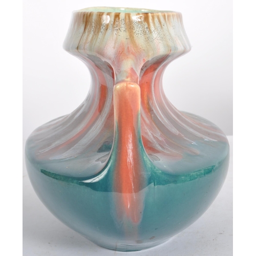 583 - A selection of retro 20th Century studio pottery vases of Art Nouveau influence having drip glazed d... 