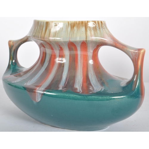 583 - A selection of retro 20th Century studio pottery vases of Art Nouveau influence having drip glazed d... 