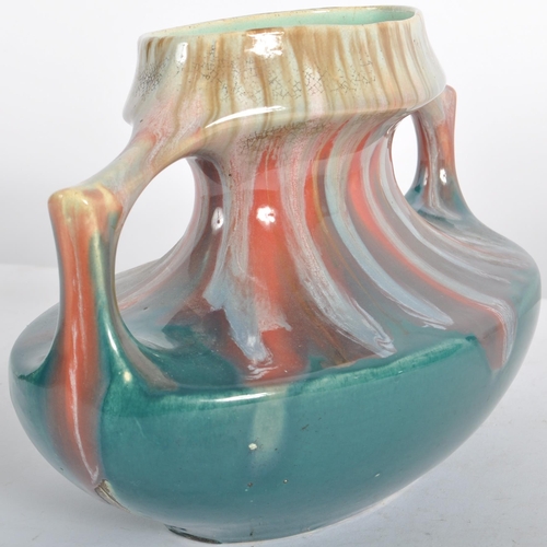 583 - A selection of retro 20th Century studio pottery vases of Art Nouveau influence having drip glazed d... 