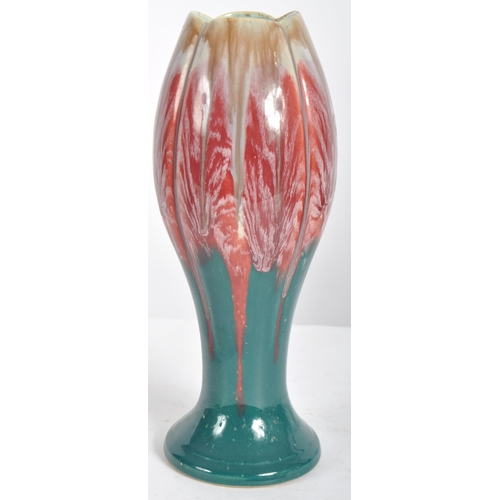 583 - A selection of retro 20th Century studio pottery vases of Art Nouveau influence having drip glazed d... 