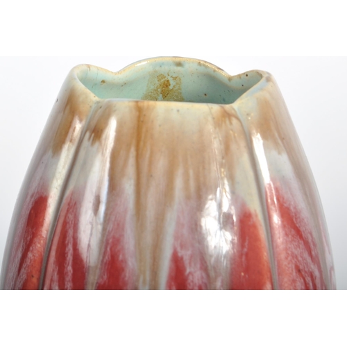 583 - A selection of retro 20th Century studio pottery vases of Art Nouveau influence having drip glazed d... 