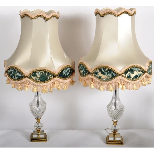 584 - A pair of 20th Century 1980s Hollywood Regency brass and crystal glass table lamp lights having tass... 