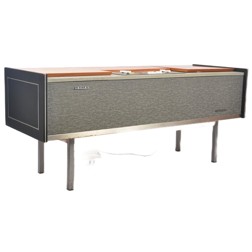 667 - Argosy - A retro mid 20th Century free standing stereogram / radio credenza having a teak and metal ... 