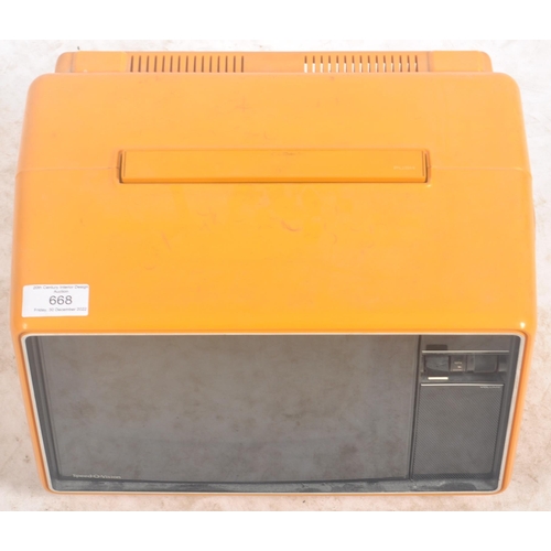 668 - Pana Pana - A retro 20th Century plastic orange cased 9 inch tv. Makers plaque to the side. Sold as ... 