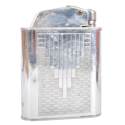 67 - Floating Lighter - An early 20th Century French Art Deco chromed brass lighter having engine turned ... 