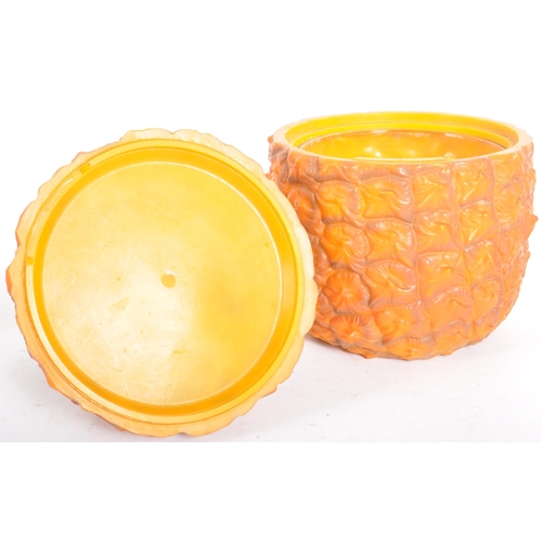 77 - Two retro vintage 20th Century 1970s ice buckets with one in the form of a pineapple and the other i... 