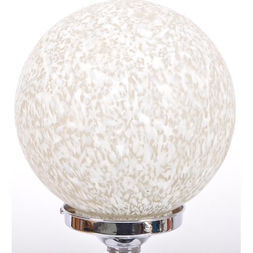 8 - An early 20th Century Art Deco chrome and glass table lamp light having a mottled glass ball shade r... 