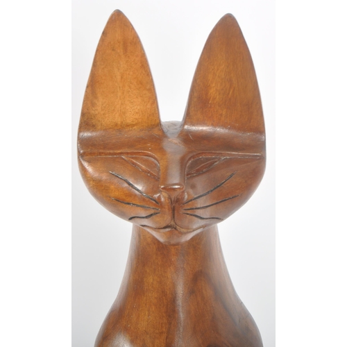 86 - A large retro mid 20th Century 1960s carved teak siamese cat sculpture / statue. Measures approx; 94... 