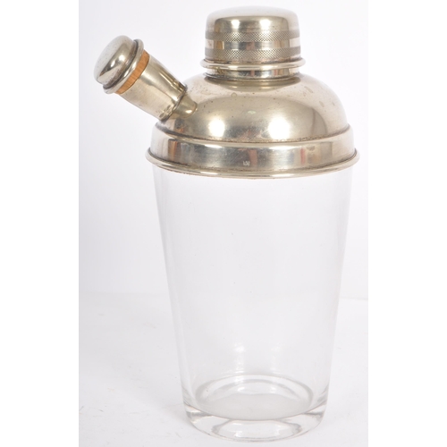 87 - A vintage early 20th Century Art Deco silver plated / silver plate cocktail shaker of typical form h... 