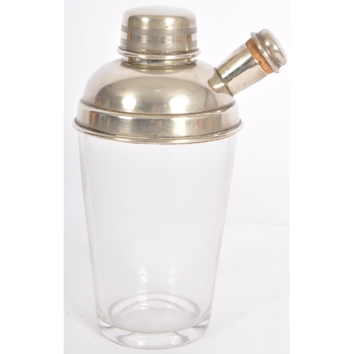 87 - A vintage early 20th Century Art Deco silver plated / silver plate cocktail shaker of typical form h... 