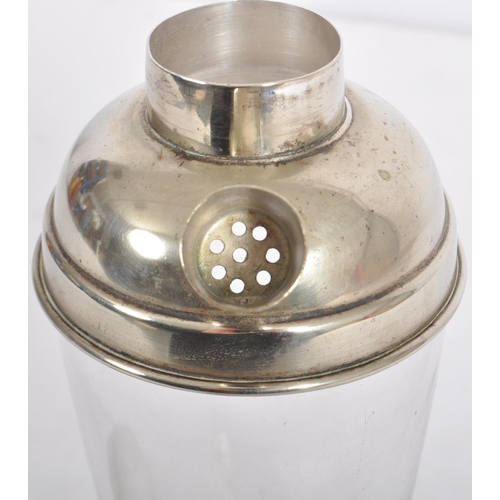 87 - A vintage early 20th Century Art Deco silver plated / silver plate cocktail shaker of typical form h... 