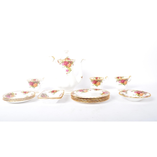 108 - A vintage 20th century Royal Albert Country Roses bone china tea service. The service comprising of ... 