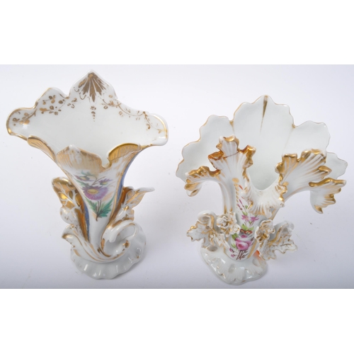 110 - A pair of early 20th Century German porcelain shaped vases. With gilt and foliate decoration, with h... 