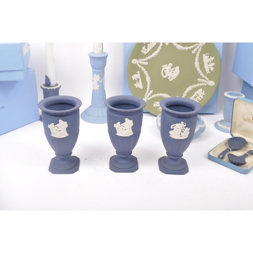 118 - Wedgwood - A collection of NOS New Old Stock boxed Wedgwood Portland blue Jasperware to include cand... 