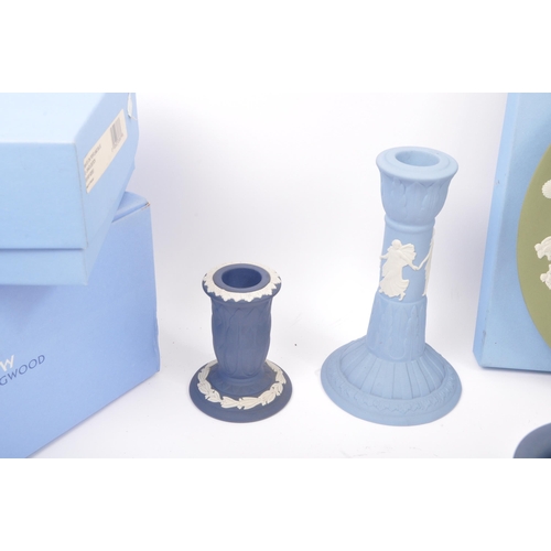 118 - Wedgwood - A collection of NOS New Old Stock boxed Wedgwood Portland blue Jasperware to include cand... 