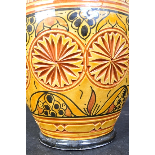 12 - A vintage 20th century Moroccan 'Safi' ceramic pottery vase in orange & yellow colourways with textu... 