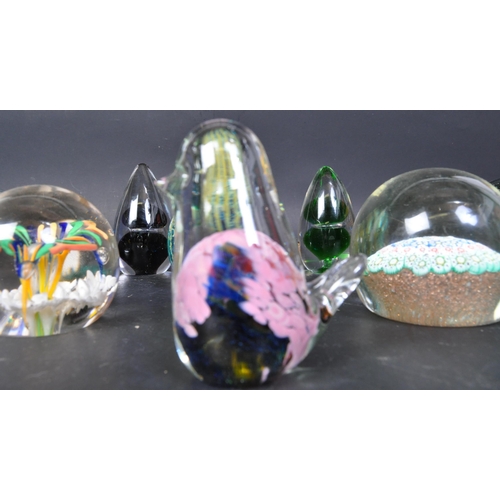 13 - A collection of vintage retro 20th Century glass paperweights. Including Mdina weight, millefiori pa... 