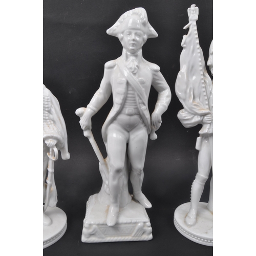 130 - A collection of three blanc de chine Dresden porcelain figures depicting Napoleonic Soldiers. Measur... 