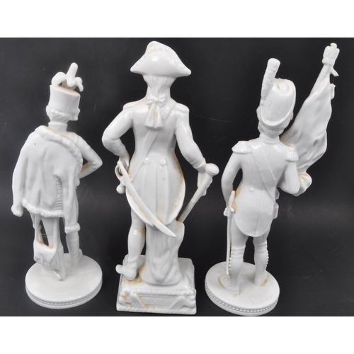 130 - A collection of three blanc de chine Dresden porcelain figures depicting Napoleonic Soldiers. Measur... 