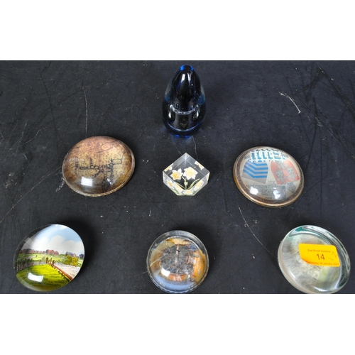 14 - A collection of retro vintage 20th Century glass paperweights. Including scenic and tourist place pa... 