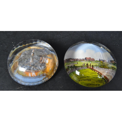 14 - A collection of retro vintage 20th Century glass paperweights. Including scenic and tourist place pa... 