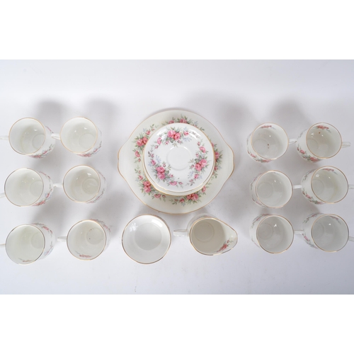 145 - A vintage 20th century bone china Royal Standard tea service in the Rambling Rose pattern. The servi... 