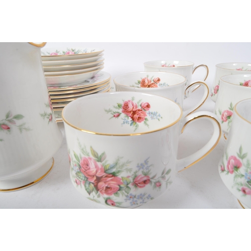 145 - A vintage 20th century bone china Royal Standard tea service in the Rambling Rose pattern. The servi... 