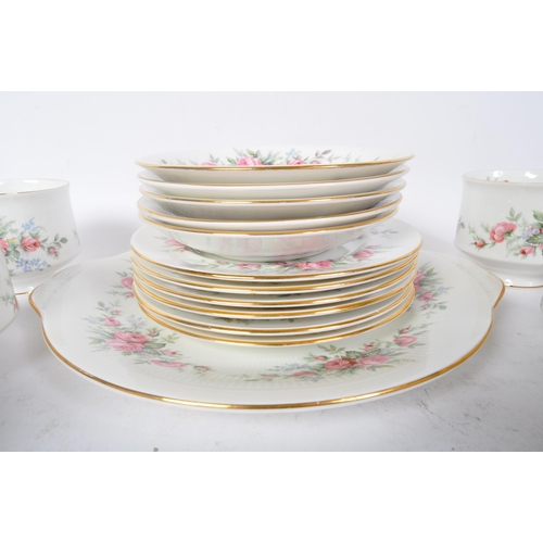 145 - A vintage 20th century bone china Royal Standard tea service in the Rambling Rose pattern. The servi... 