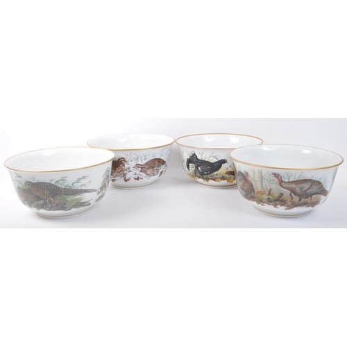 147 - A set of four Franklin Mint game bird fruit bowl / centre piece. Together with a hand painted porcel... 