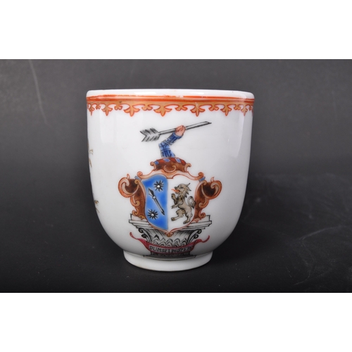 15 - A 19th Century china armorial beaker / cup. With hand painted gilt and red decoration. With coat of ... 