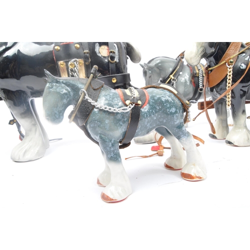 152 - A collection of four china porcelain horses with wood and metal cart. Four horses with harnesses inc... 