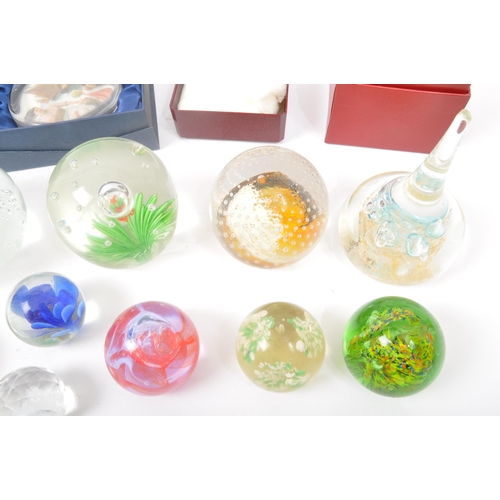 153 - A collection of vintage 20th Century glass paperweights. Comprising of; teardrop, spherical floral, ... 