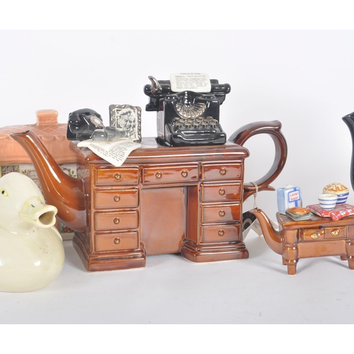 165 - A collection of 20th Century Paul Cardew & other novelty ceramic teapots. Each of unusual form with ... 