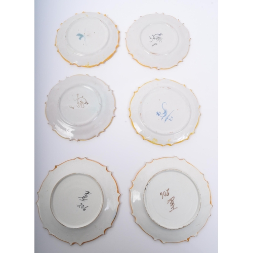 173 - A collection of six 19th century French faience tin-glazed cabinet plates. Each being hand painted w... 